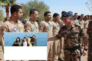 ملك الاردن عبد الله الثاني بن الحسين يصافح الطيار الاسير معاذ الكساسبة